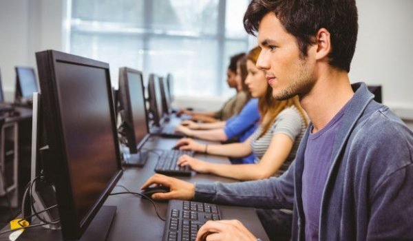 Premium Photo _ Focused student in computer class